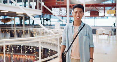 Buy stock photo Happy, smile and portrait of Asian man in a mall for christmas gift with discount, sale or promotion. Happiness, excited and male person customer in a retail shopping center for xmas holiday presents