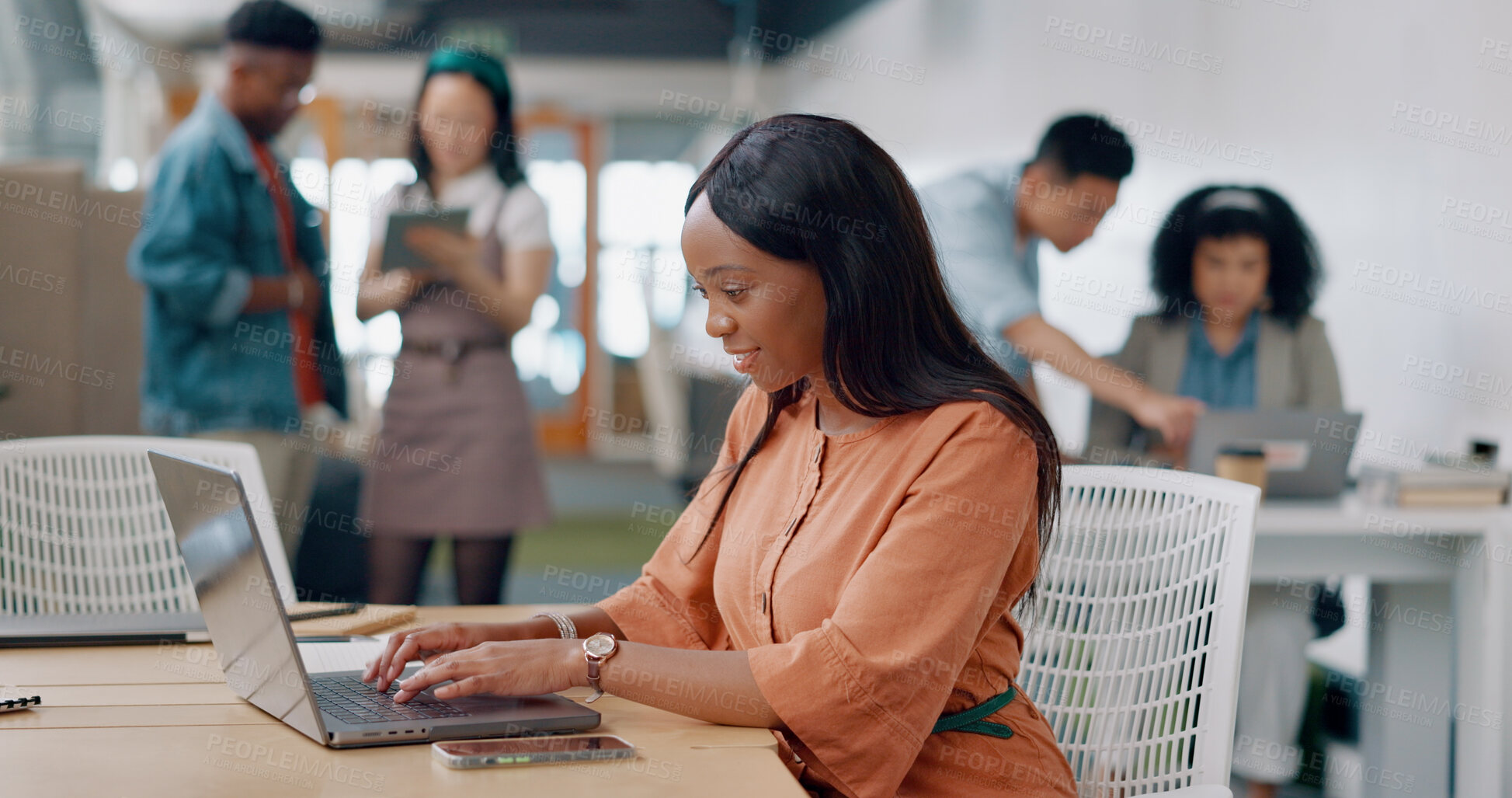 Buy stock photo Black woman in office, happy and typing on laptop for market research, email or online report at startup. Creative businesswoman in coworking space with computer, web search and job at tech agency.