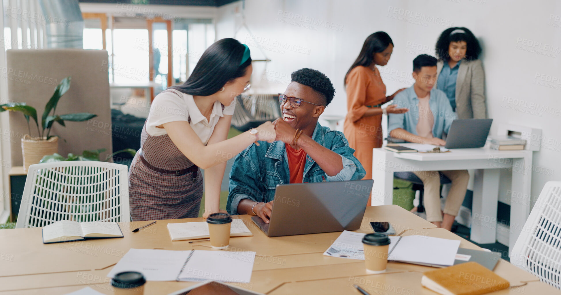 Buy stock photo Laptop news, fist bump and business people celebration, cheers and excited for partnership, team building or designer solidarity. Winner goal, support and diversity women celebrate web design success