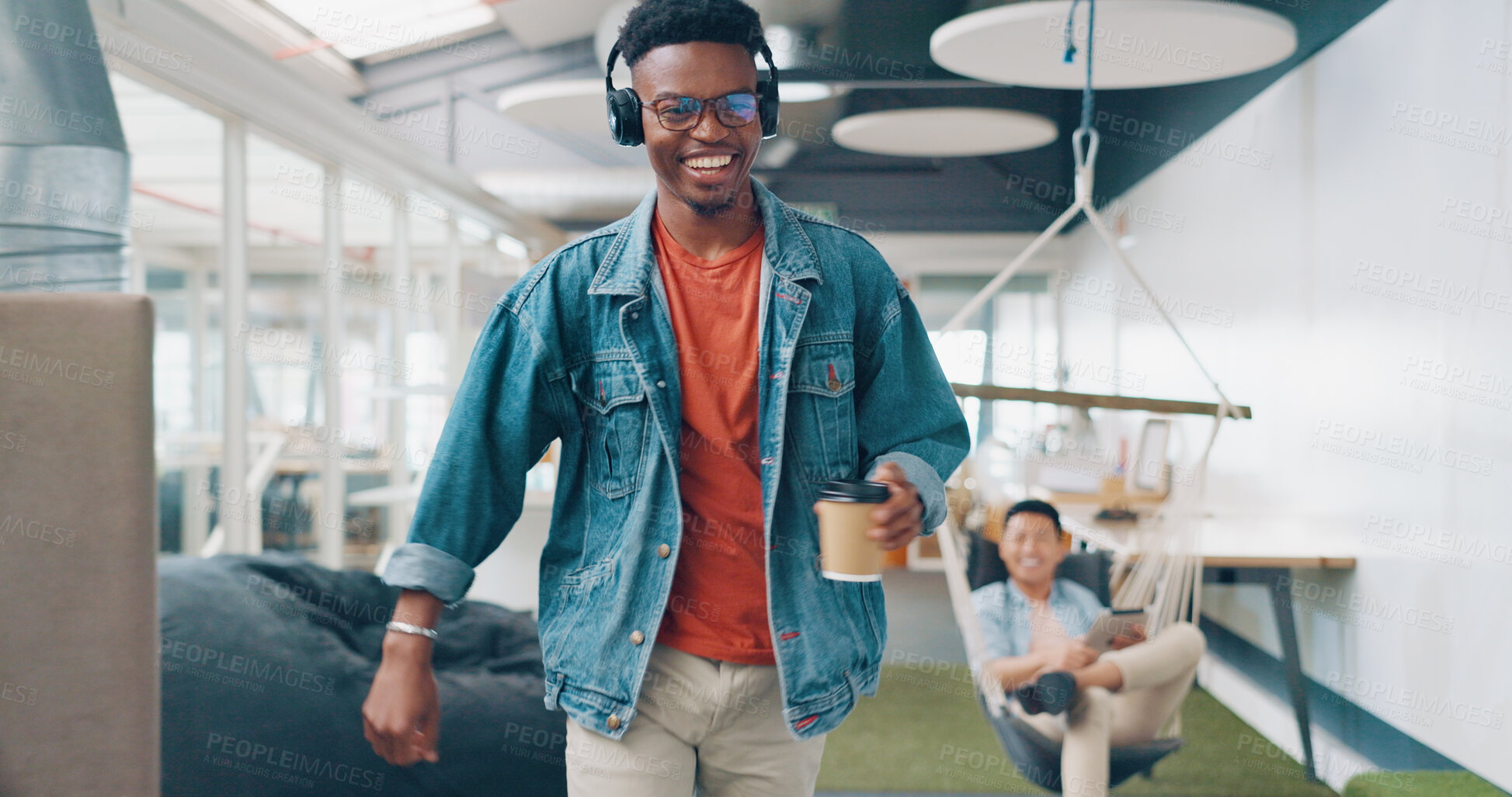 Buy stock photo Coffee, employee and happy black man listening to music in the morning walking in startup agency or company. Smile, carefree, and young person or worker laughing in corridor of office building