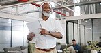 Dance, music and headphones, senior black man at work with energy and positive mindset, happiness and motivation in the workplace. Dancing, radio and fun in workspace, excited for work or retirement.