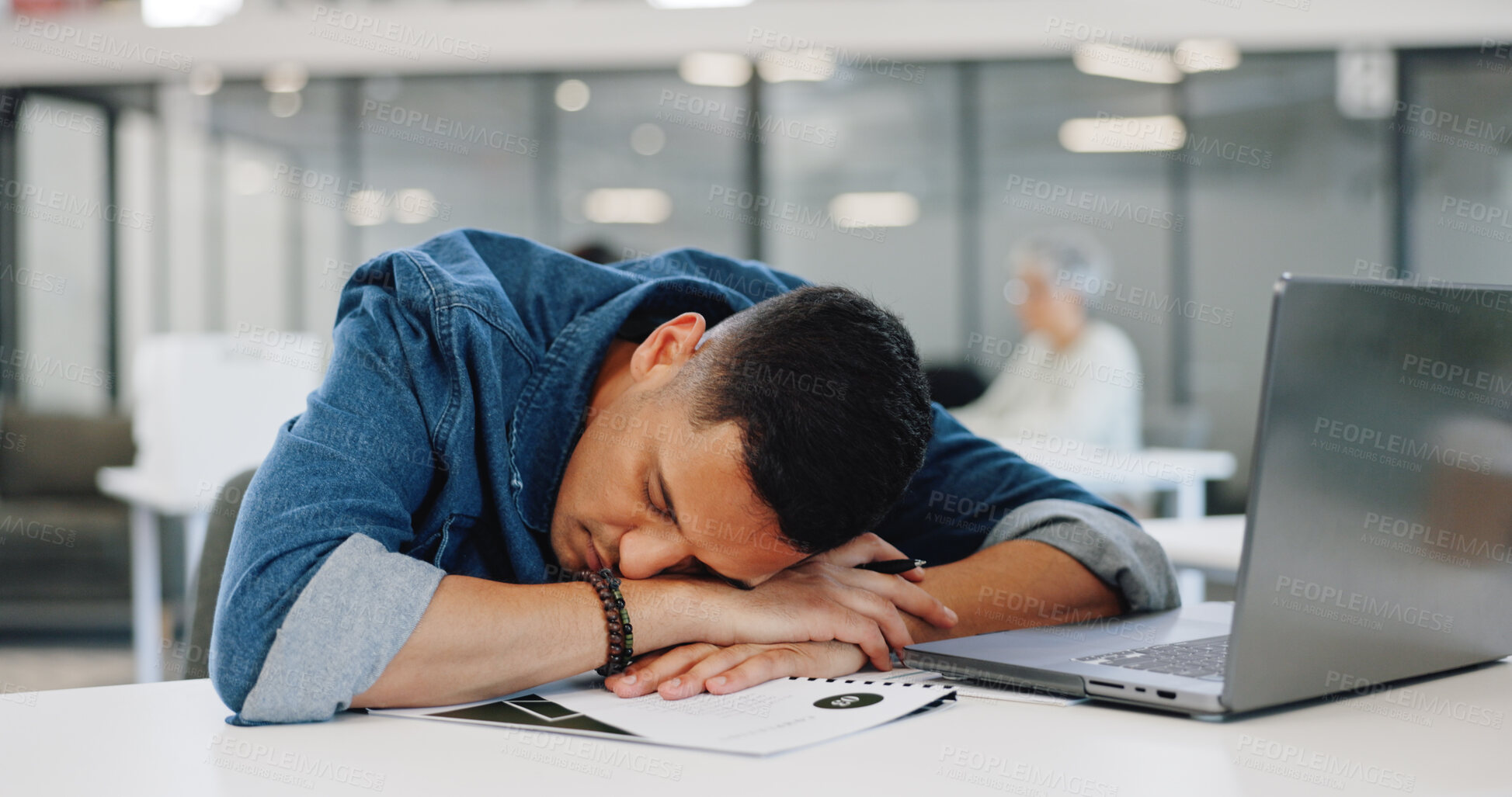 Buy stock photo Tired man, laptop and sleeping on desk in burnout, fatigue or taking a nap and overworked at office. Exhausted male person or employee asleep in stress, anxiety or overtime on table at workplace
