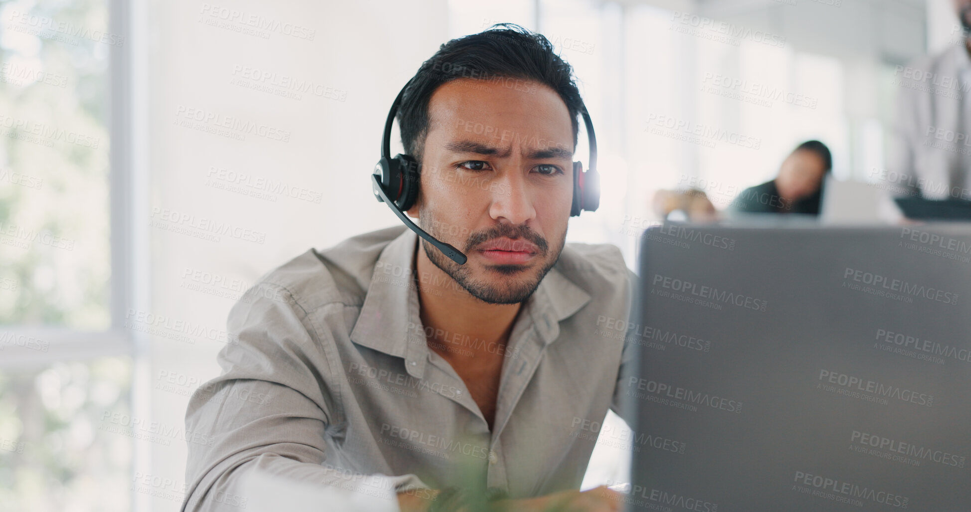 Buy stock photo Asian man, call center and confused on laptop in mistake, customer service or complaint at office. Male person, consultant or agent with error, problem or issues on computer in online advice at work