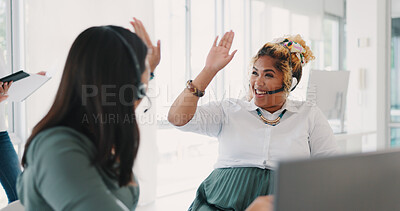 Women, business and excited for planning, conversation and workplace. Female employees, coworkers and high five for celebration, marketing campaign and happy for sales growth, achievement and idea.