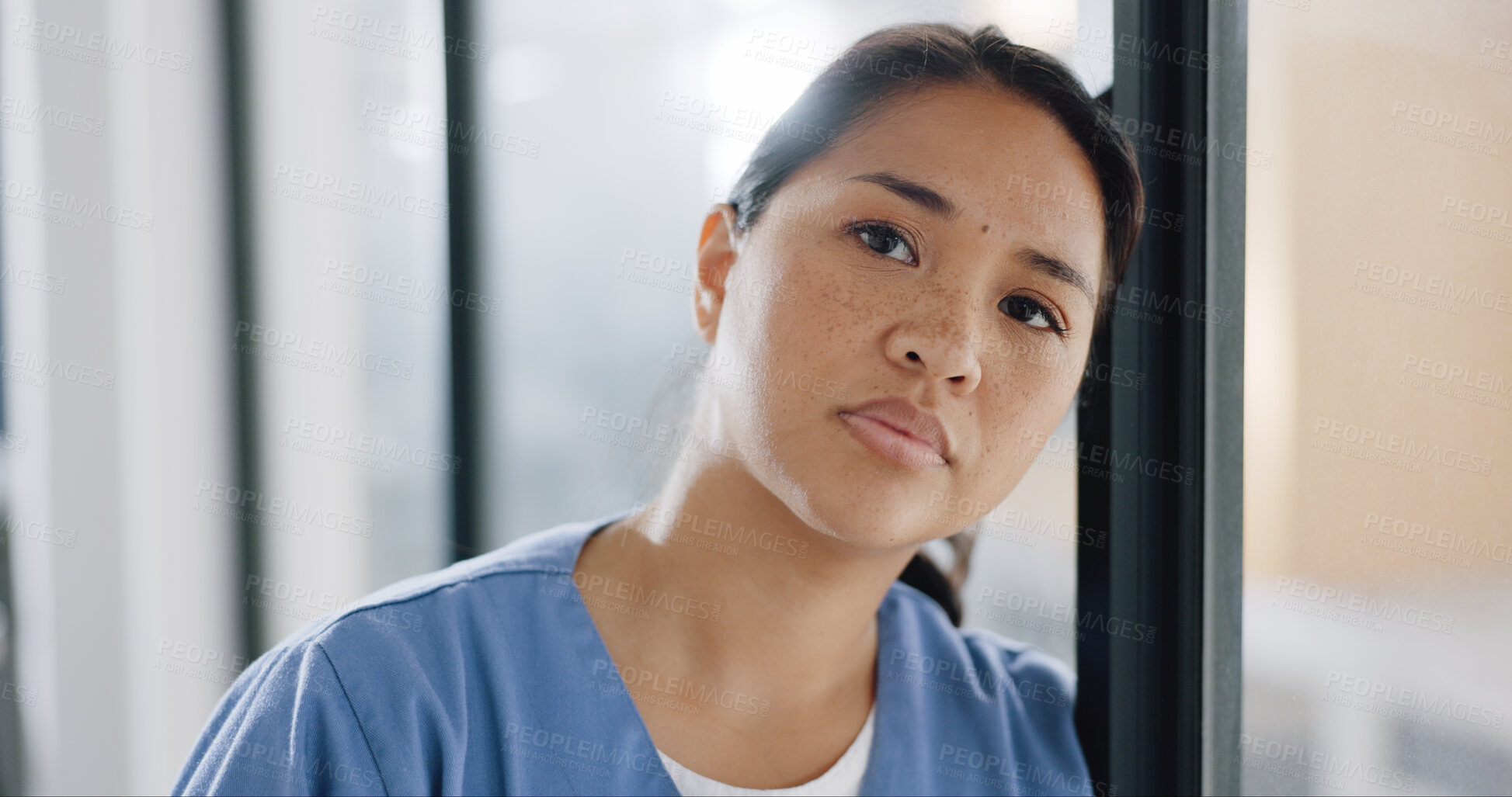 Buy stock photo Portrait, woman or tired doctor at window with burnout, problem and mental health crisis in clinic. Stress, fatigue and anxiety in hospital, sad medical nurse in doubt and fear for healthcare service