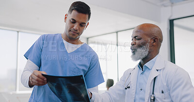 Buy stock photo Doctor, nurse in meeting with xray for advice and help in healthcare discussion for cardiology. Medical talk, mature black man or team in collaboration for surgery with an Indian surgeon in hospital