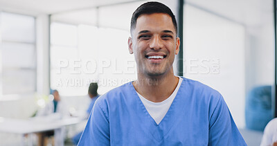 Face, man and happy nurse in hospital, smiling and ready for tasks. Portrait, medical professional and confident, proud and successful male doctor with vision, mission and wellness goals in clinic.