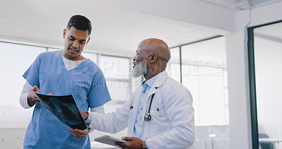 Buy stock photo Doctor, surgeon in meeting with xray for advice and help in healthcare discussion for lungs mri. Medical talk, mature black man or team in collaboration for surgery with an Indian nurse in hospital