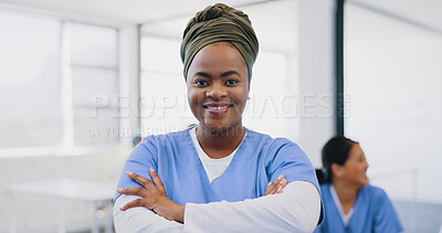 Face, black woman arms crossed and doctor with smile, consultant and in hospital. Leader, African American female and medical professional with happiness, ready for surgery, procedure and healthcare.