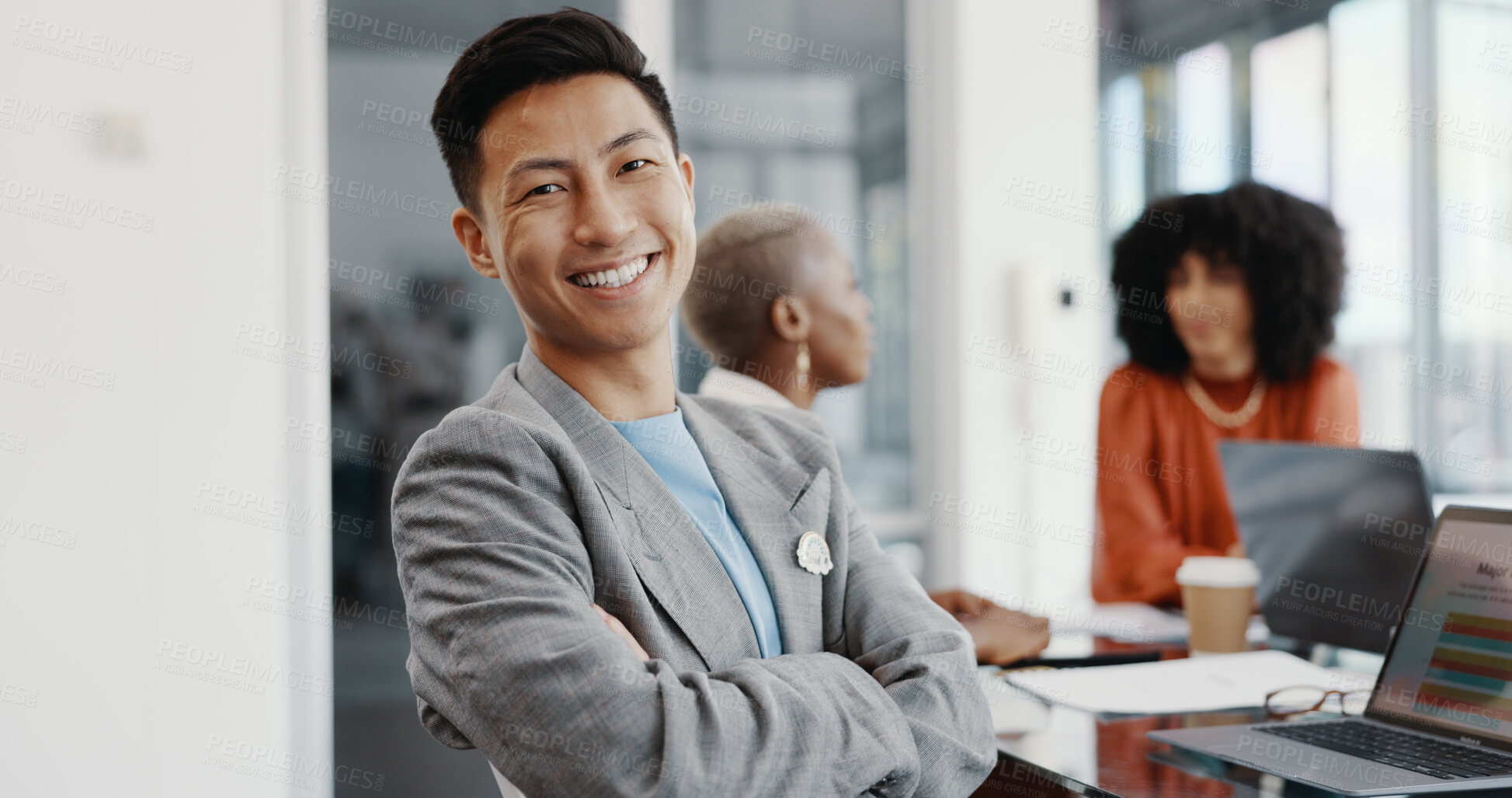 Buy stock photo Laptop, meeting and portrait of an Asian man with arms crossed in the office conference room planning a corporate strategy. Happy, smile and a professional businessman working on a project with team