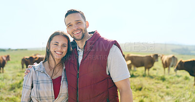 Cow, love and happy couple on a cattle farm hugging, bonding and enjoy quality time outdoors in nature. Smile, portrait and woman farming cows and harvesting animal livestock with a farmer on field