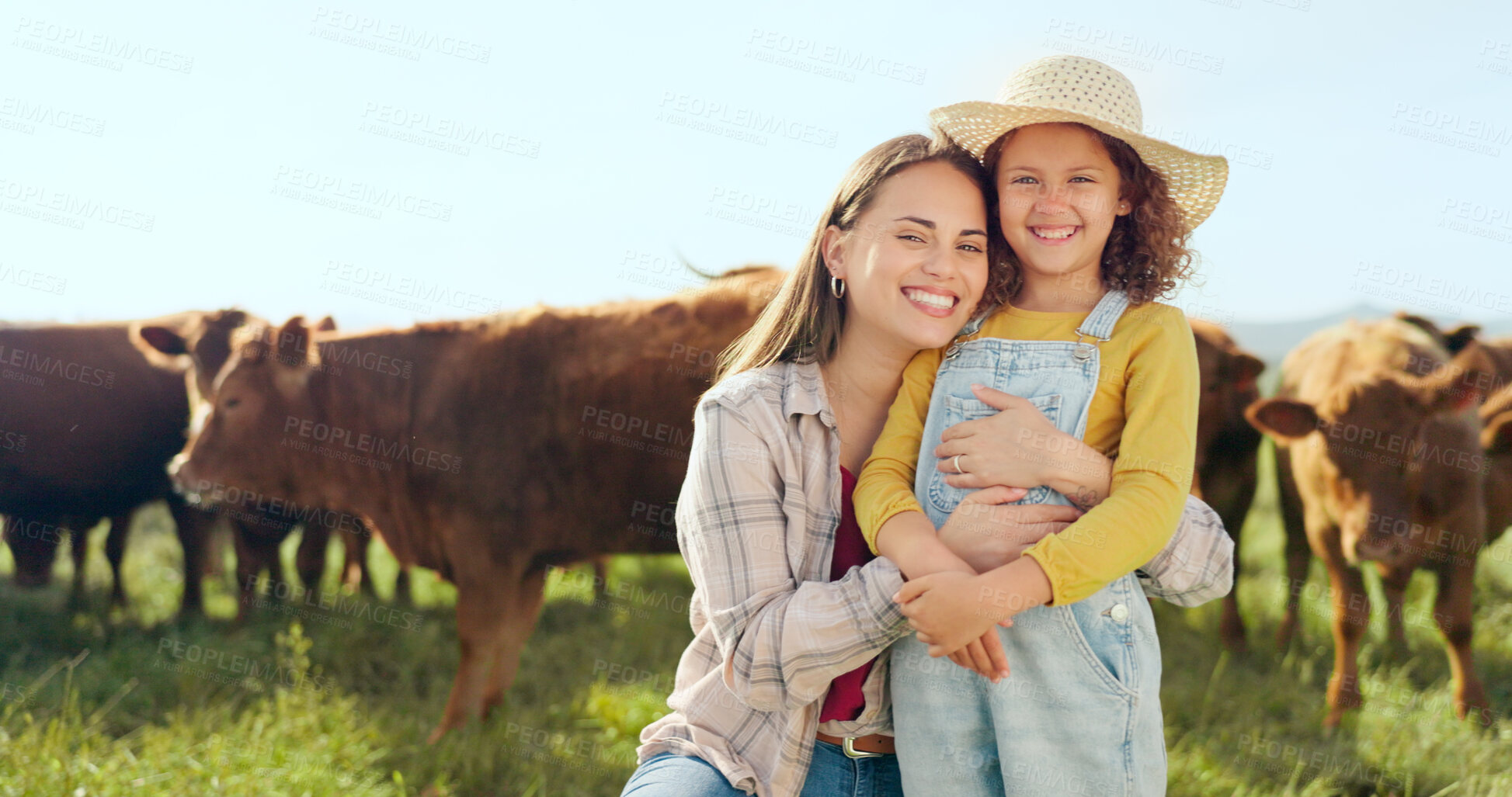 Buy stock photo Farm, portrait and a woman hugging her daughter with cattle for agriculture in a field for sustainability. Countryside, family and a farmer mama embracing her girl child outdoor for dairy farming