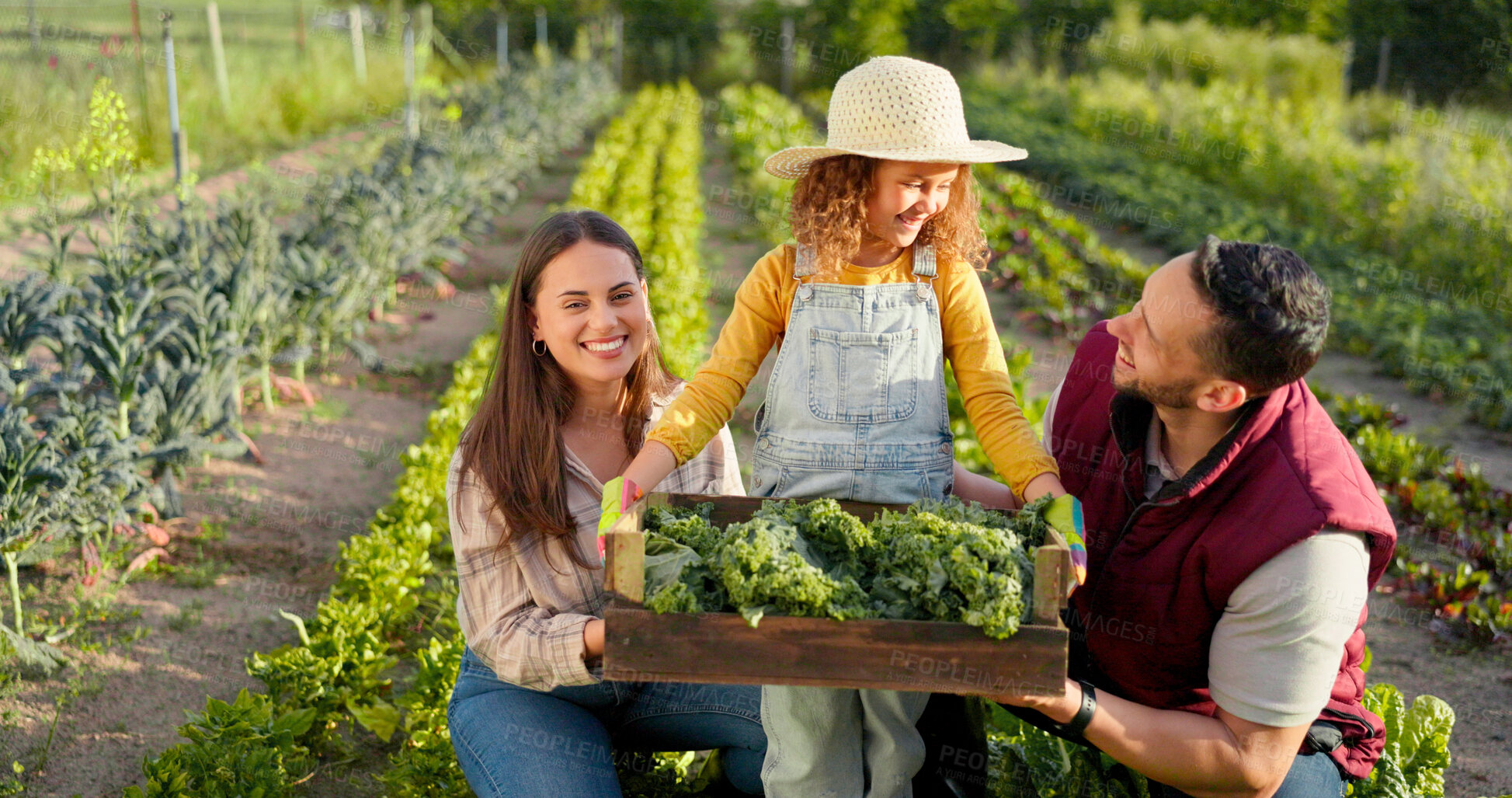 Buy stock photo Family, agriculture and parents with child and vegetables, green and sustainable agro business and harvest. Crops, food and people bonding in countryside, faming and support with love and happiness