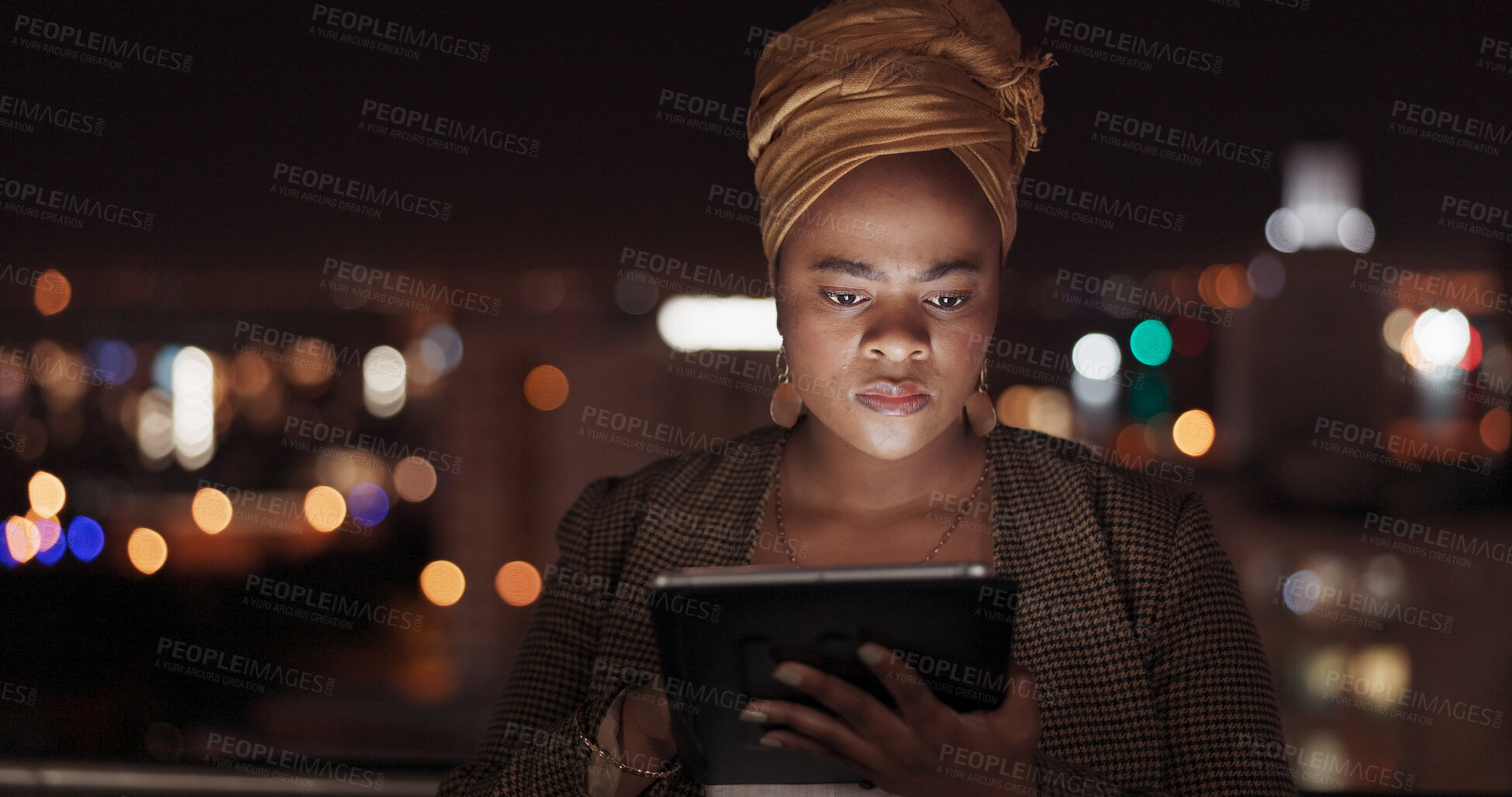 Buy stock photo Tablet, night and professional black woman reading, analysis and check sales data, research information or website blog. Rooftop, serious and business person review of online communication in Nigeria