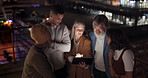 Tablet, collaboration and night with a business team working together in the city on their office balcony. Finance, teamwork and meeting with a man and woman employee group talking strategy outside