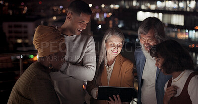 Tablet, collaboration and night with a business team working together in the city on their office balcony. Finance, teamwork and meeting with a man and woman employee group talking strategy outside