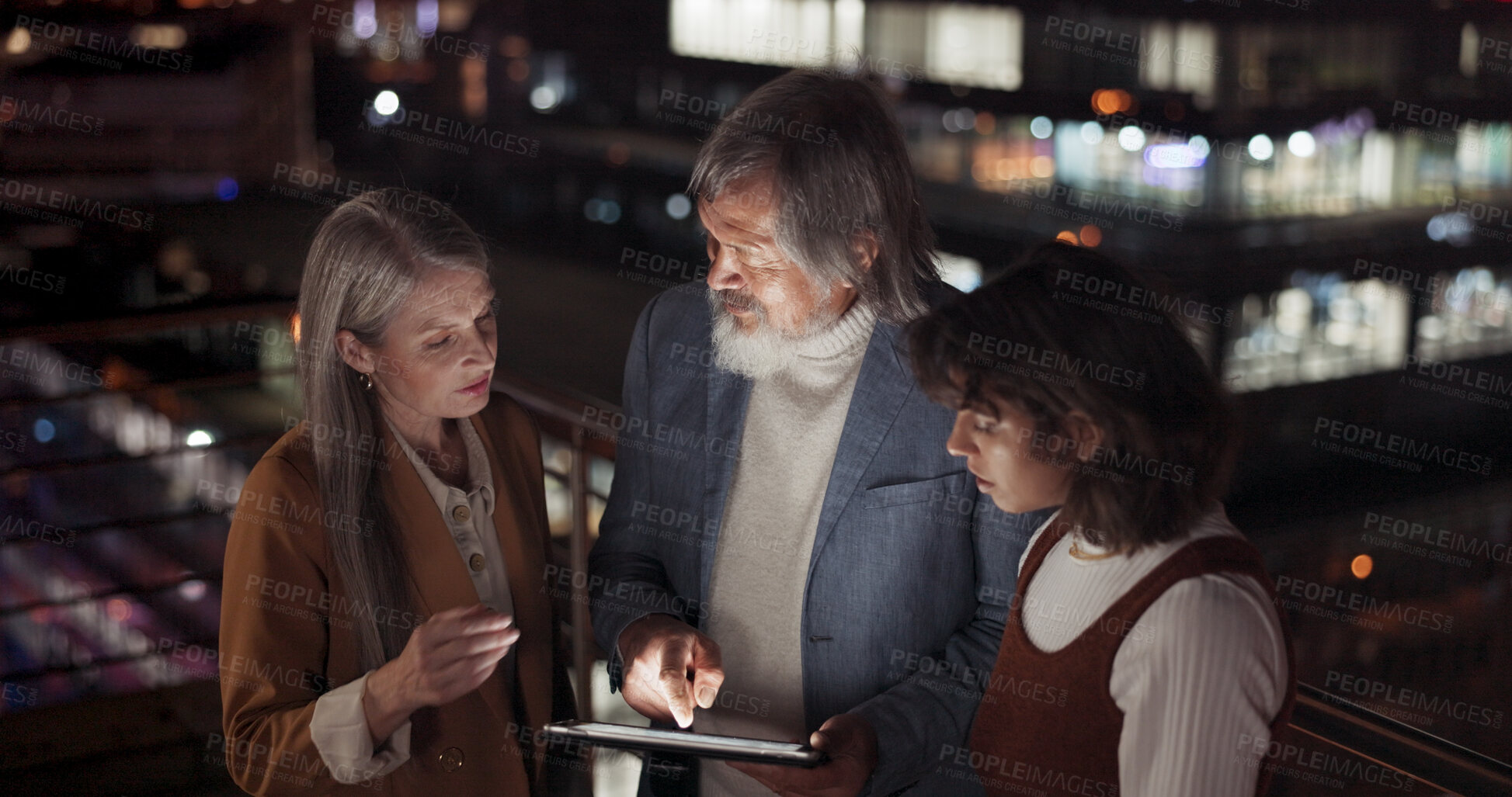 Buy stock photo Tablet, night and a trading team on the balcony of their office together for collaboration or planning. Technology, teamwork and overtime training with an investment group in the city for late work