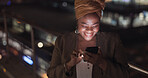 City, rooftop and black woman on a phone at night networking on social media or the internet. Technology, happiness and African lady browsing online with a cellphone on an outdoor balcony in a town.