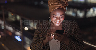 City, rooftop and black woman on a phone at night networking on social media or the internet. Technology, happiness and African lady browsing online with a cellphone on an outdoor balcony in a town.