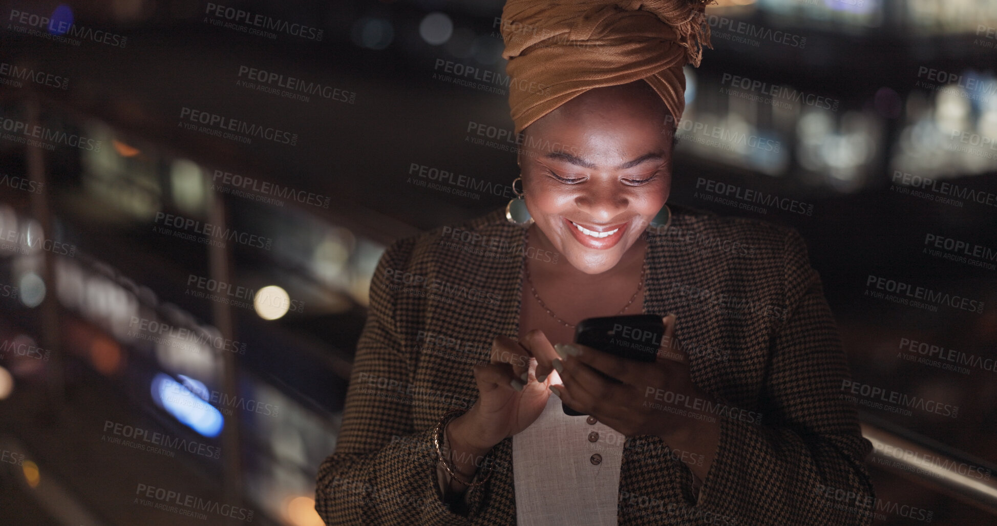 Buy stock photo Smartphone, night and black woman in city for business, reading email or networking on social media on rooftop. Phone, balcony and happy African professional outdoor on internet, typing and bokeh