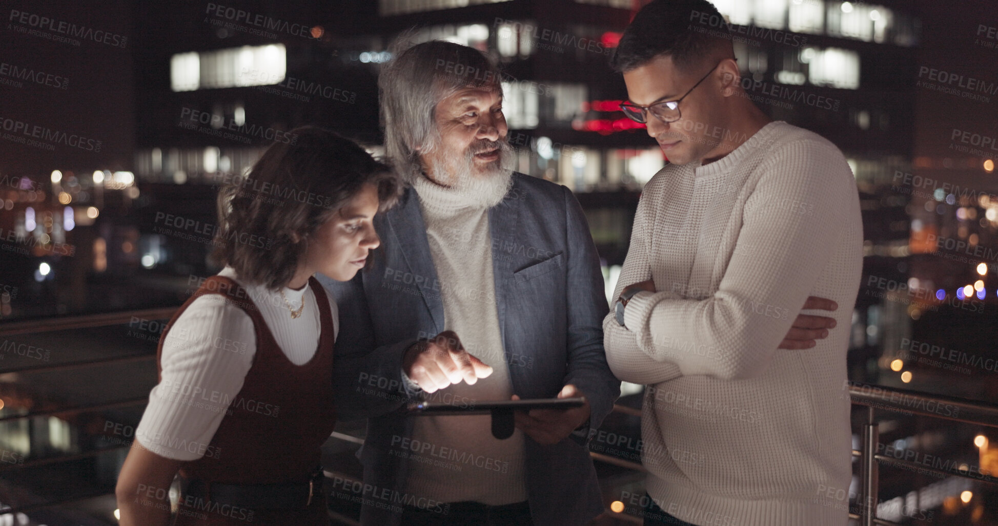 Buy stock photo Tablet, night and planning with business people  in city on the rooftop office together for collaboration or training. Technology, teamwork and overtime coaching with an employee group in the outdoor