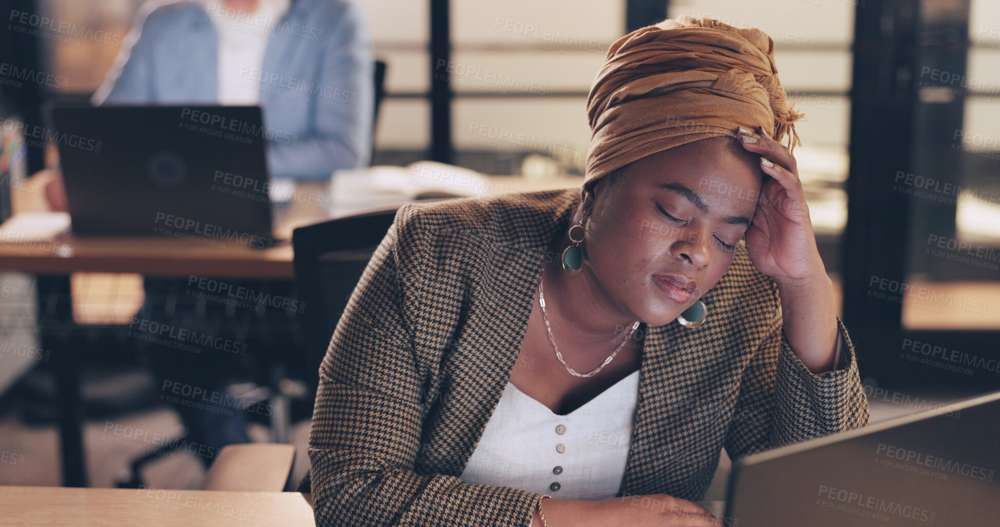 Buy stock photo Office, laptop and black woman with headache, night and burnout with anxiety, fatigue and tired. African person, employee and business with depression, overtime and pc for deadline and migraine