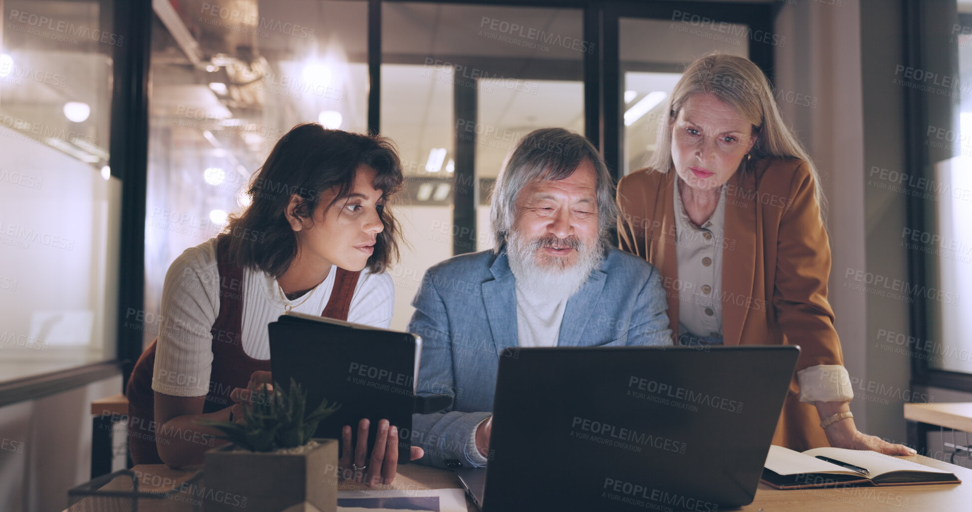 Buy stock photo Mentor, laptop and business people teamwork on night project, digital finance portfolio or feedback review of stock market research. Financial economy, investment collaboration and trading in office