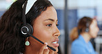 Call center, support and face of a black woman in telemarketing for communication, customer service and consulting. Contact us, conversation and customer support worker talking and giving advice