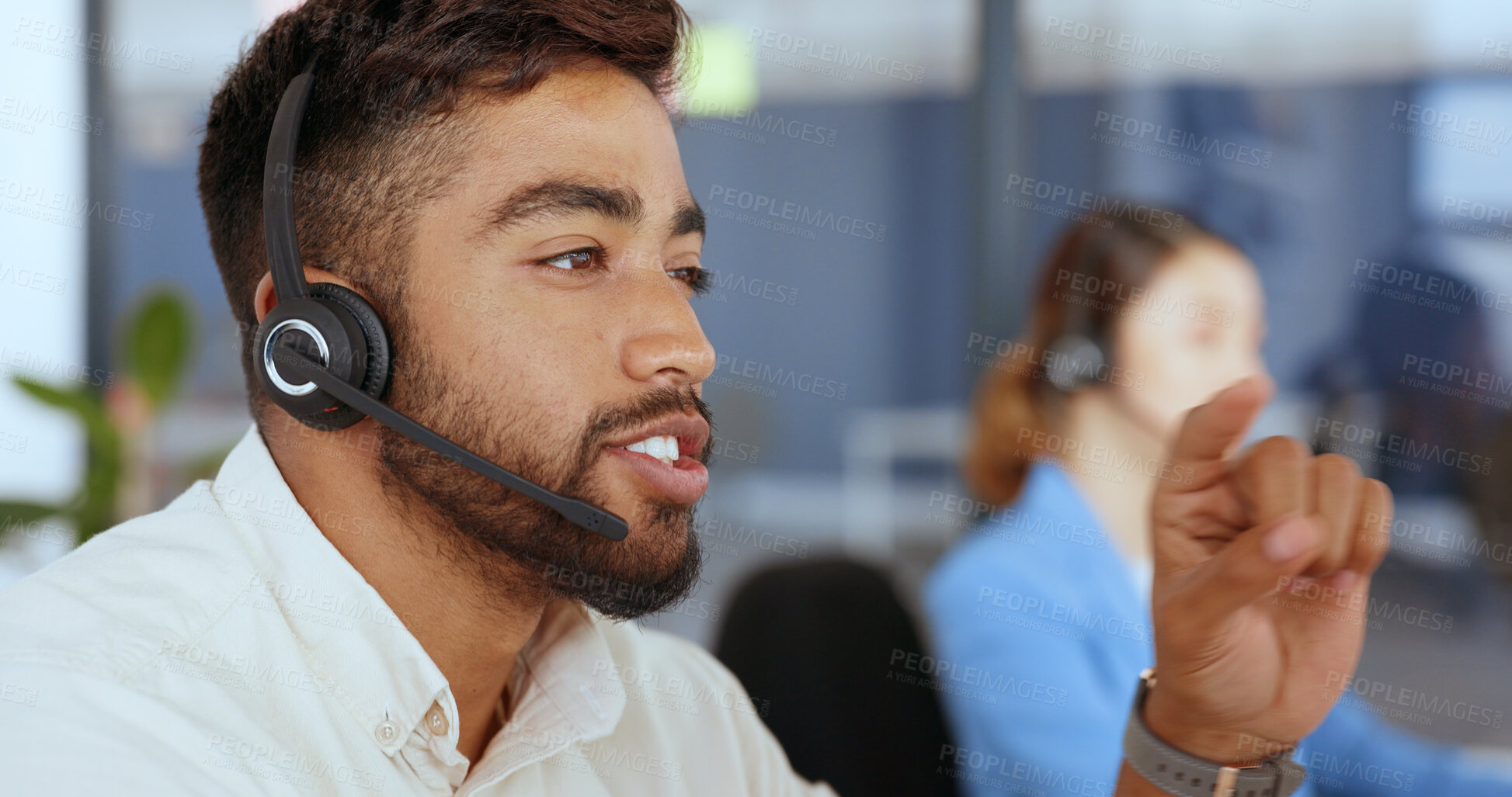 Buy stock photo Call center, customer service and man consultant in office for online consultation with headset. Crm, contact and professional Indian male telemarketing or sales agent working on technical support.