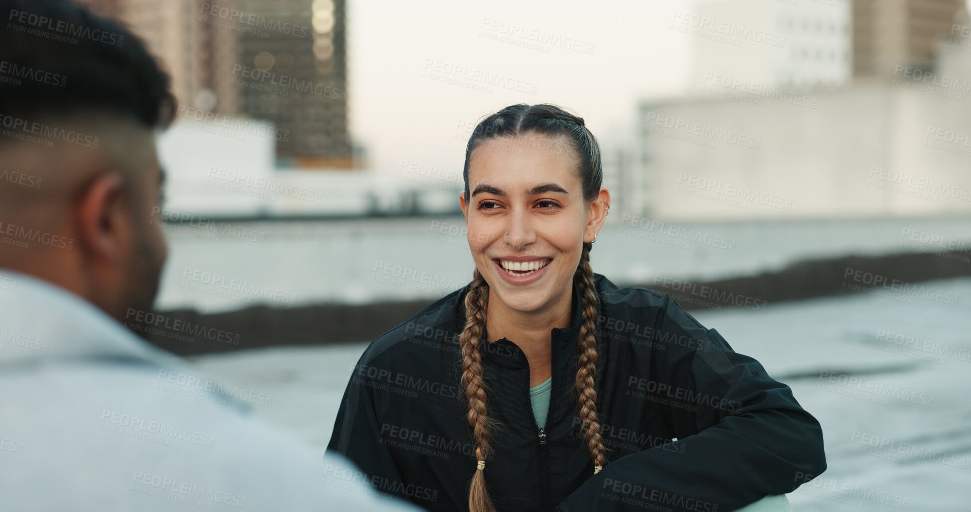 Buy stock photo Fitness, happy and woman athlete in the city for a health, wellness and cardio workout or exercise. Smile, sports and young couple on a rest or break after training on rooftop in urban town.