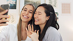 Friends taking selfie with a phone on the wedding morning preparing for the day together in room. Event, smile and happy bride showing her ring while taking picture with her best friend on smartphone