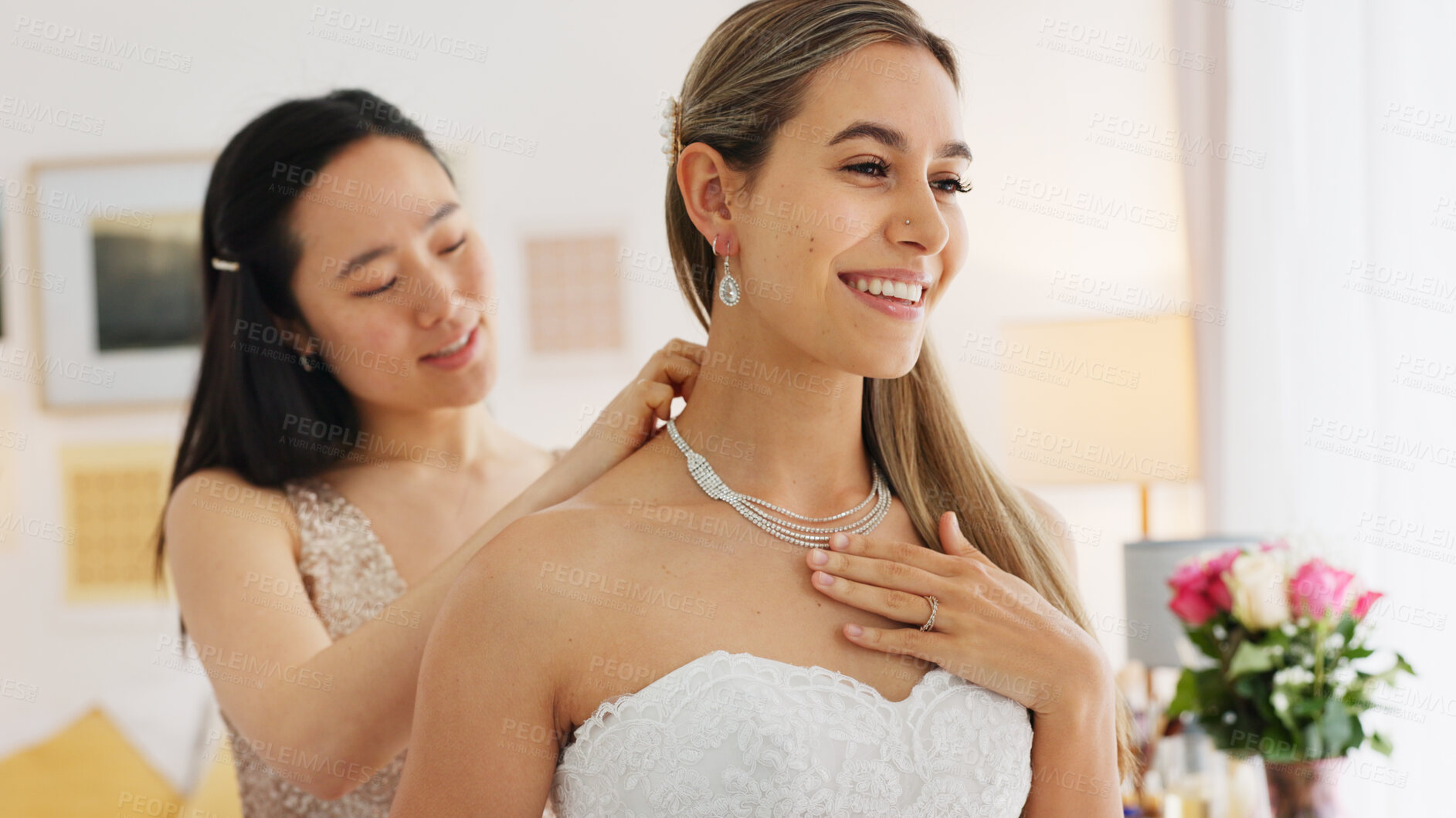 Buy stock photo Wedding, friends and bride with necklace jewelry with a smile, wealth and luxury with beauty and fashion lifestyle. Women, silver diamond chain and bridesmaid in dressing room helping with happiness