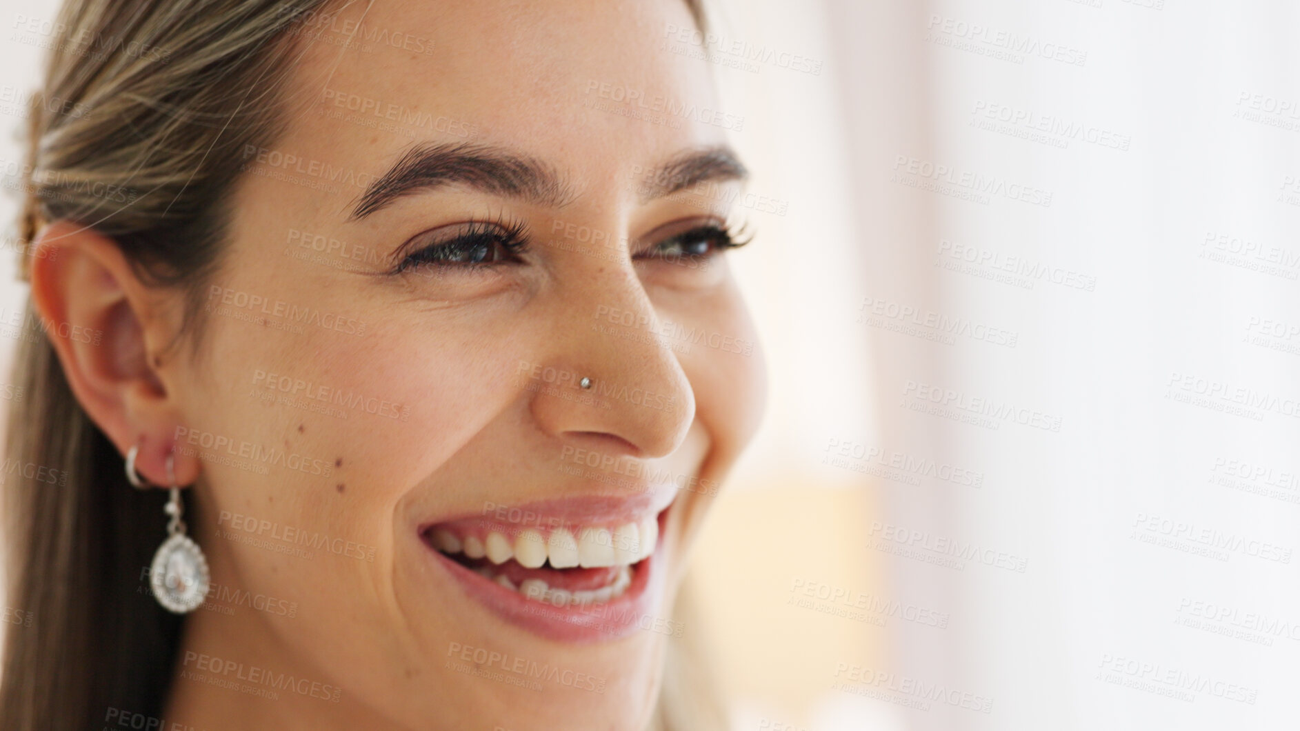 Buy stock photo Face, beauty and smile with a woman laughing closeup in her home for skincare or makeup. Cosmetics, happy or funny and a confident young person with jewelry accessories for wealth or fashion