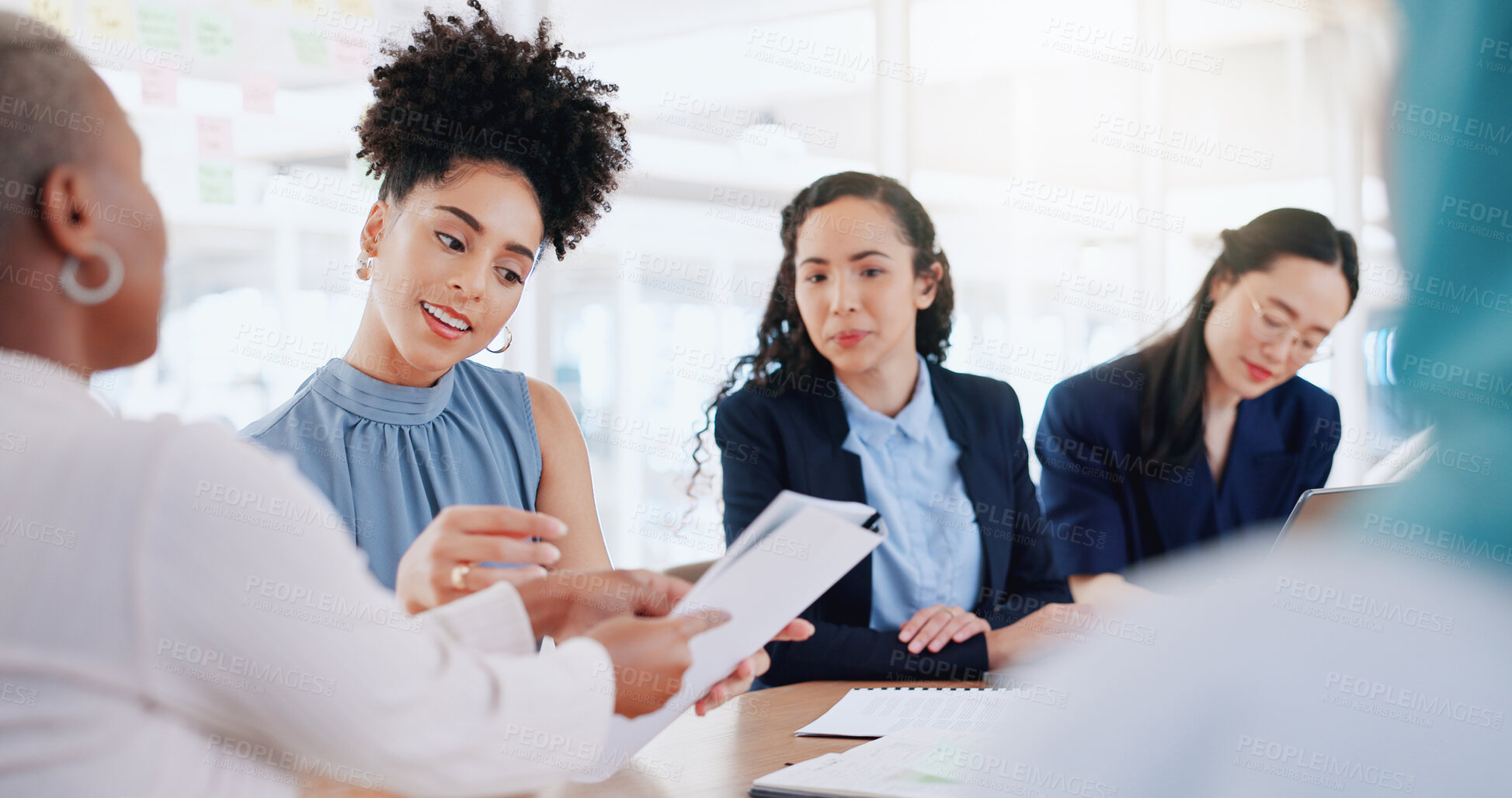 Buy stock photo Workshop, meeting and feedback, group of women at desk together in office with coworking at startup. Collaboration, paperwork and manager with team for performance stats, coaching and brainstorming.