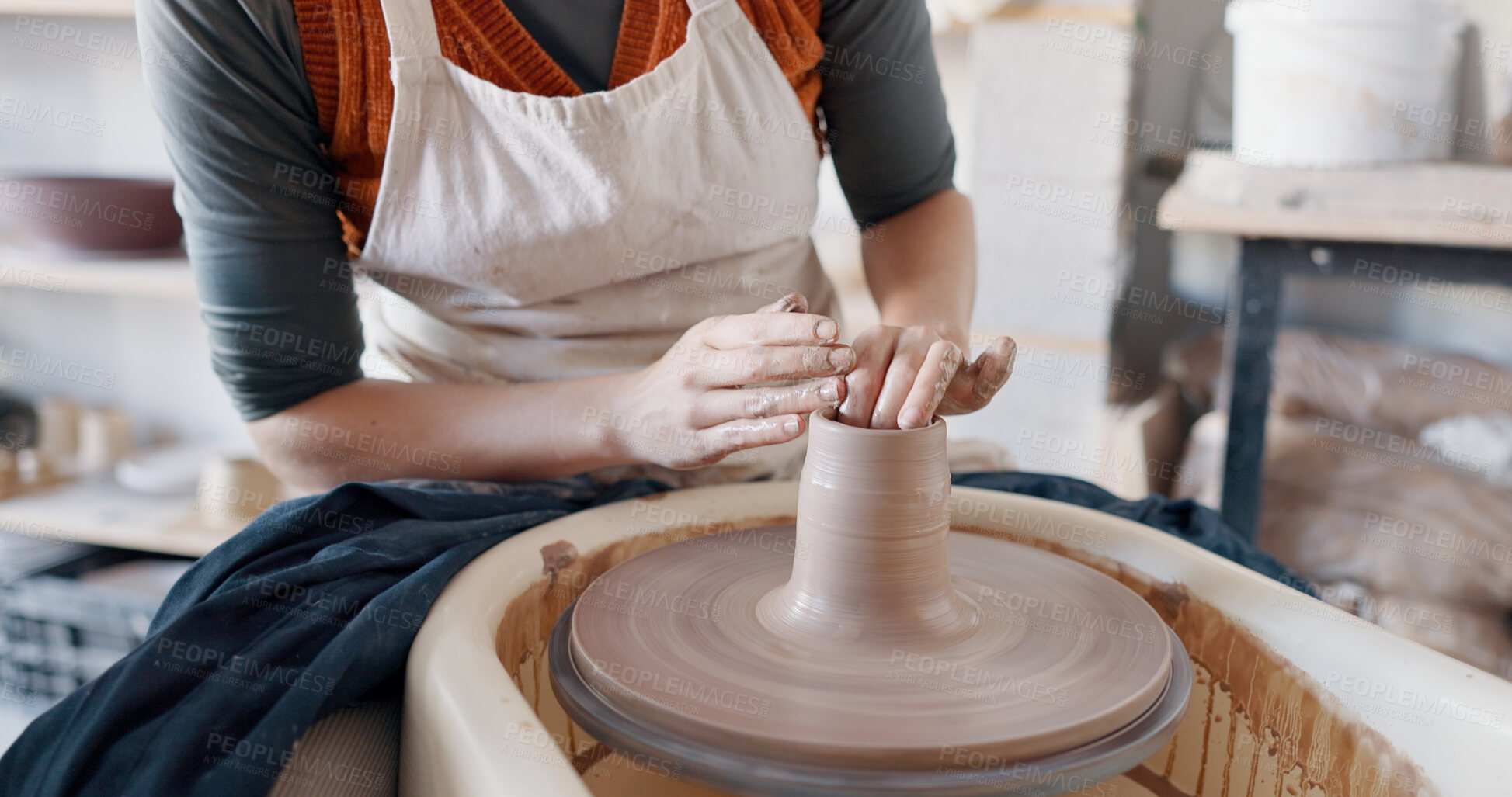 Buy stock photo Pottery, hands and clay on wheel, art with container or bowl in studio, workshop or classroom. Artist, craft and hobby with creativity, unique mold, shape or handmade ceramic product design process