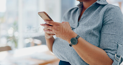 Business woman, hands and phone in social media texting for communication, chatting or browsing at the office. Hand of female employee typing, searching or online conversation on mobile smartphone