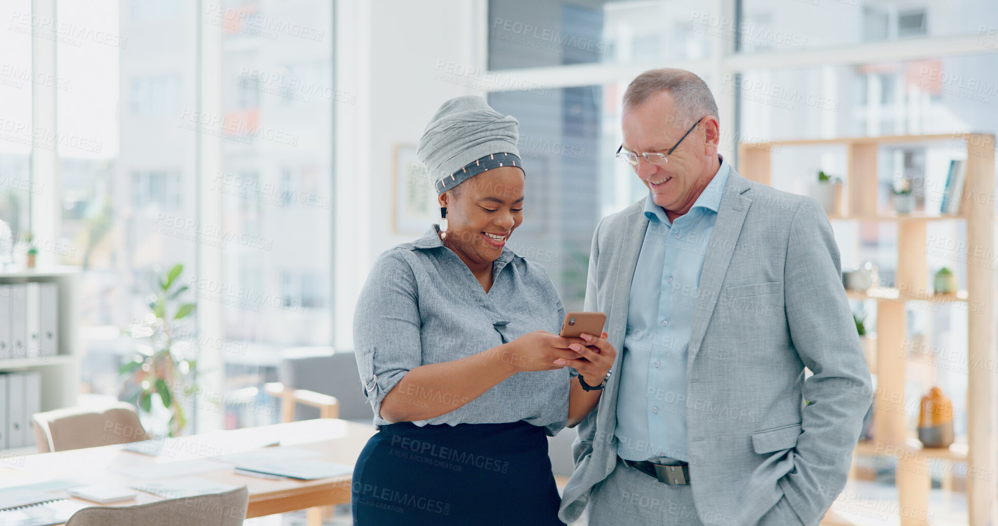 Buy stock photo Black woman, phone news or happy businessman on social media laughing at funny meme in finance office. Senior executive, smile or friends on network for a joke or conversation on lunch break at work 