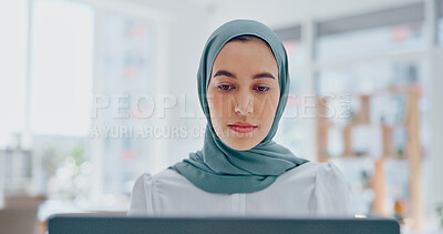 Islamic woman, laptop and focus working in office with hijab for religion, reading online communication or arabic company manager. Muslim, entrepreneur and planning on digital tech with head scarf