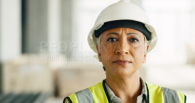 Buy stock photo Serious, industrial and portrait of woman engineer with at indoor building site for project management. Industry, confidence and senior construction worker or contractor for maintenance inspection.