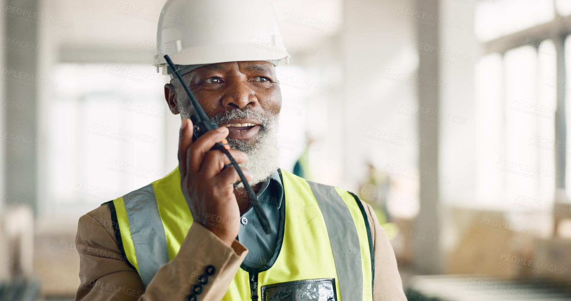 Buy stock photo Construction, black man and walkie talkie at site for engineering, building development and maintenance. Contractor, mature technician and architect with radio communication for project management 