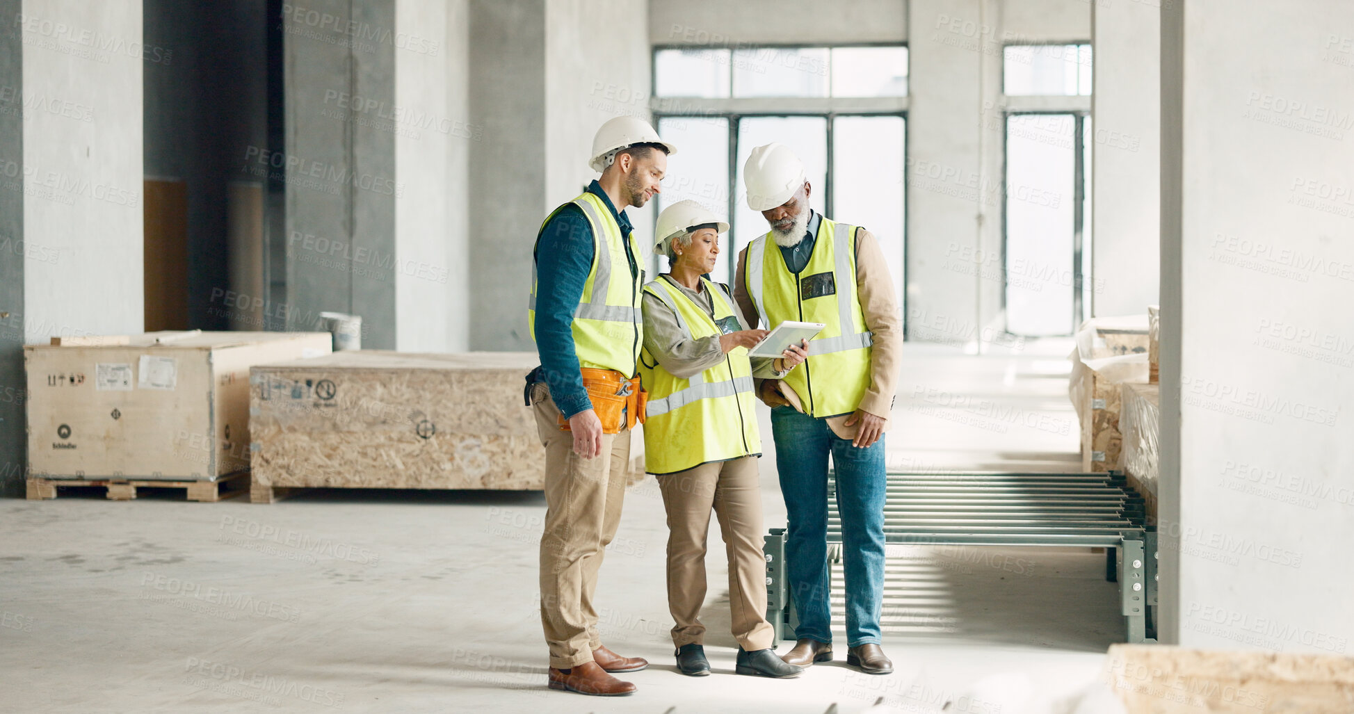 Buy stock photo Construction, team and discussion with tablet for building, architecture and property maintenance. Group, engineering and collaboration on digital software, industrial project and planning renovation