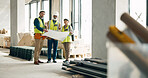 Building, construction and architect with a team working on site while reading a blueprint or plans indoors. Teamwork, engineer and architecture with a man and woman contractor group in collaboration