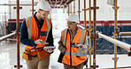 Construction worker, working together and conversation with tablet, communication and construction business. Engineer, job site with man and woman talking, collaboration and building trade.