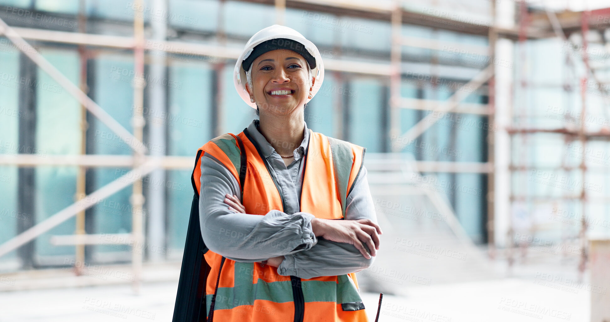 Buy stock photo Construction site portrait, arms crossed and happy woman, architect or builder of civil engineering, building or property. Engineer, manager and professional contractor smile for real estate project