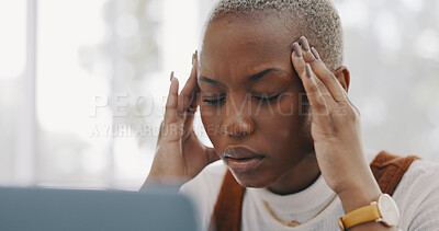 Stress, burnout and headache of black woman on laptop typing email in office at marketing company. Anxiety, tired and migraine of employee frustrated thinking of professional online response.