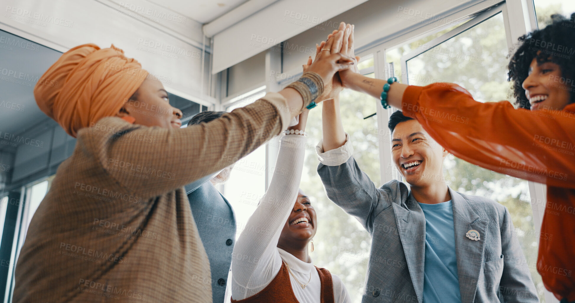 Buy stock photo Happy creative people, high five and team building in winning, success or achievement together at office. Group of employees touching hands in celebration, meeting or motivation in goals at workplace