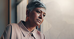 Shot of a mature businesswoman looking stressed out in an office