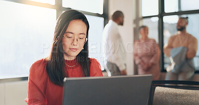 Business, technology and Asian woman in office, working with team on laptop, tablet and computer in workplace. Success, teamwork and female worker walking, meeting and planning for digital marketing