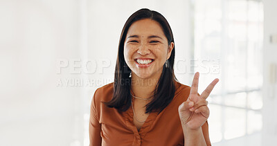 Business woman, face or peace sign in modern office, marketing company or advertising startup for Indonesian about us. Portrait, happy smile or fun hands gesture for creative designer