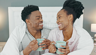 Happy, couple and coffee in bed of black people relax and calm with happiness in a house bedroom. Smile, love and calm home experience of a man and woman together with a blanket drinking tea